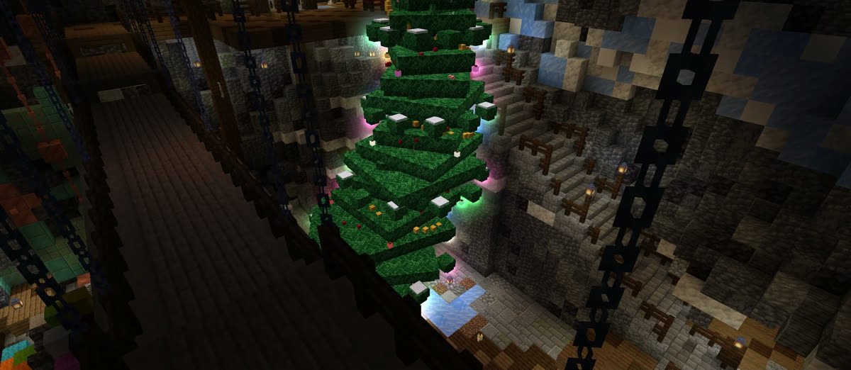 A Christmas tree growing up through the Grinch's cave, lit with coloured lights